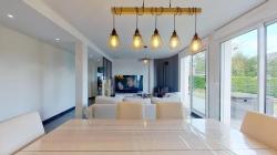 LOPERHET : Maison de plain pied T7 et un T2 indépendant avec un grand garage et un atelier au coeur du bourg