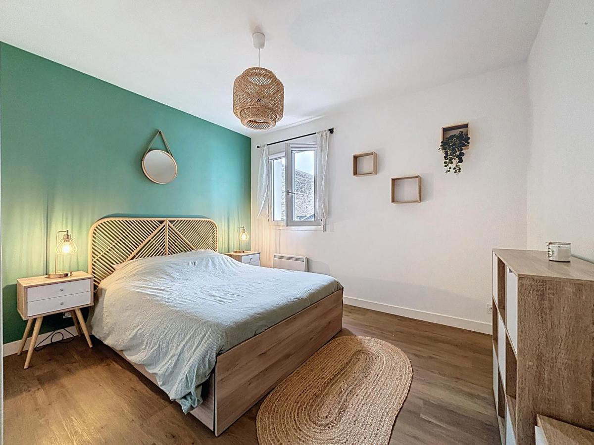 CENTRE-VILLE : joli appartement deux chambres, garage en meublé
