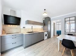 CENTRE-VILLE : ravissant appartement de 79m² avec deux chambres et garage