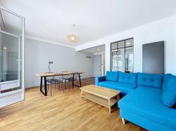 CENTRE-VILLE : ravissant appartement de 79m² avec deux chambres et garage