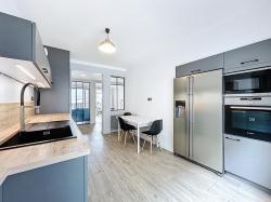 CENTRE-VILLE : ravissant appartement de 79m² avec deux chambres et garage