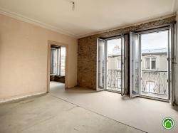  CENTRE-VILLE / SAINT MICHEL : ravissant appartement  avec deux chambres et balcon à renover