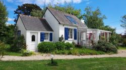 PORSPODER : Propriété de standing T8 récente ossature bois avec double garage proche du rivage sur un grand parc de 2880 m2
